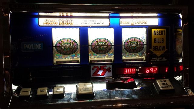 Explosion of gold coins and jackpot symbols on a slot screen for Progressive Jackpot Thrills.